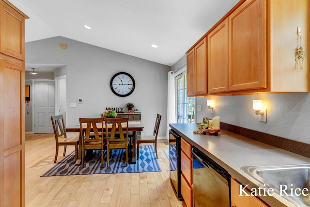 kitchen with wine cooler, lofted ceiling, light wood-style floors, dishwashing machine, and a sink