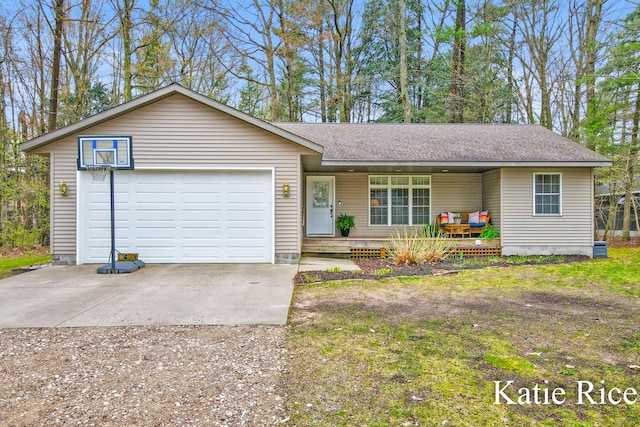 single story home with an attached garage, a shingled roof, covered porch, and driveway