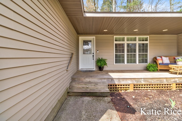 doorway to property with a porch