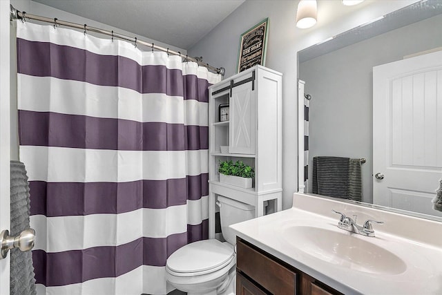 8308 E G Ave, Kalamazoo, MI 49048 - bathroom with vanity, a shower with shower curtain, and toilet