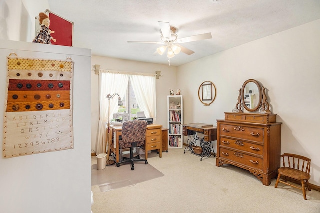 carpeted office with ceiling fan
