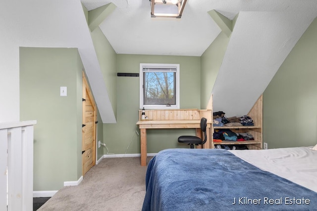 bedroom with baseboards and carpet flooring