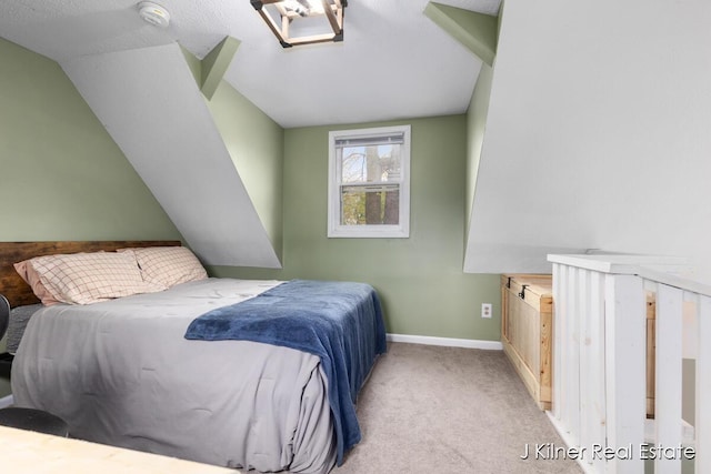 bedroom with baseboards and carpet floors
