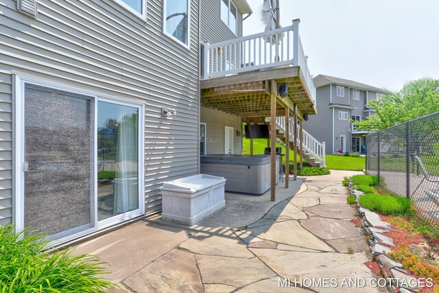 9145 Winterberry Dr, West Olive, MI 49460 - view of patio / terrace with a hot tub, stairs, and a wooden deck