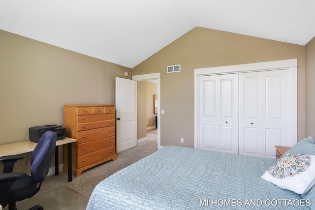 9145 Winterberry Dr, West Olive, MI 49460 - bedroom featuring carpet floors, vaulted ceiling, a closet, and a desk