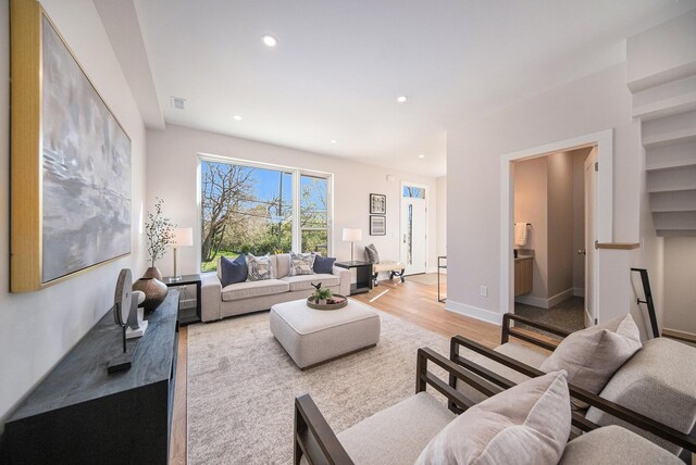 205 Sunset Rd, Ann Arbor, MI 48103 - living area featuring visible vents, recessed lighting, light wood finished floors, and baseboards