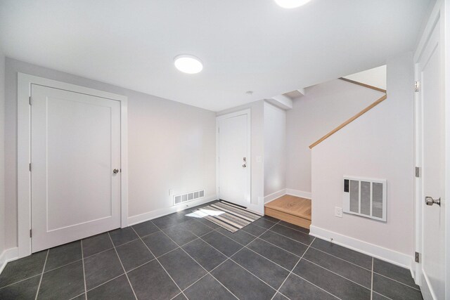 205 Sunset Rd, Ann Arbor, MI 48103 - interior space with stairs, tile patterned floors, visible vents, and baseboards