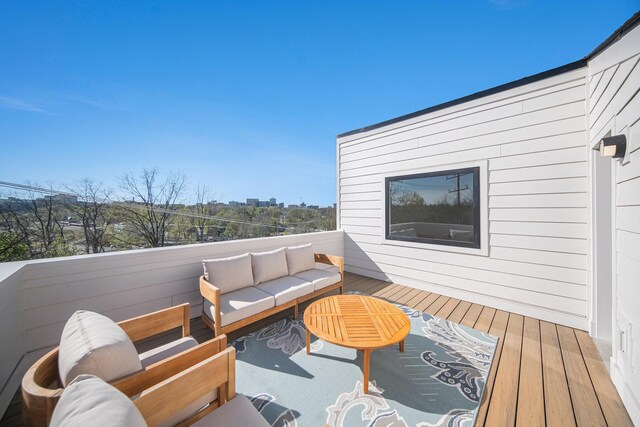 205 Sunset Rd, Ann Arbor, MI 48103 - wooden terrace with an outdoor living space