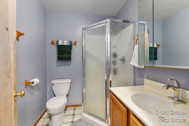 4600 S Teal Ln, Newaygo, MI 49337 - full bath with vanity, baseboards, a stall shower, and toilet