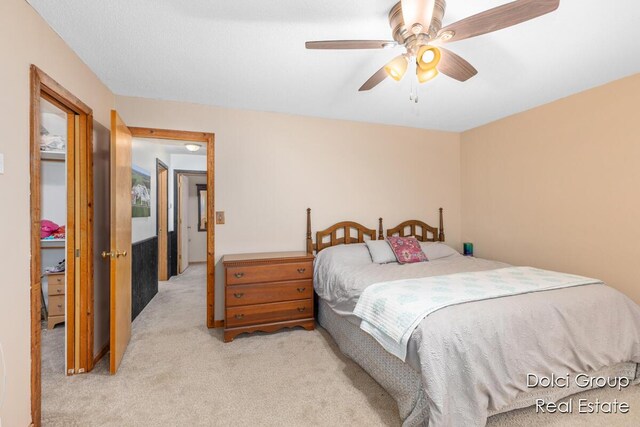 4600 S Teal Ln, Newaygo, MI 49337 - bedroom with ceiling fan and light carpet