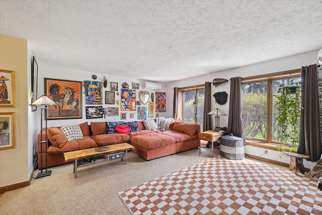 living area featuring baseboards, a wall mounted air conditioner, a textured ceiling, and carpet floors