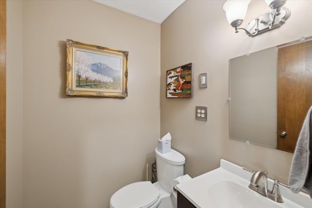 half bath with toilet and vanity