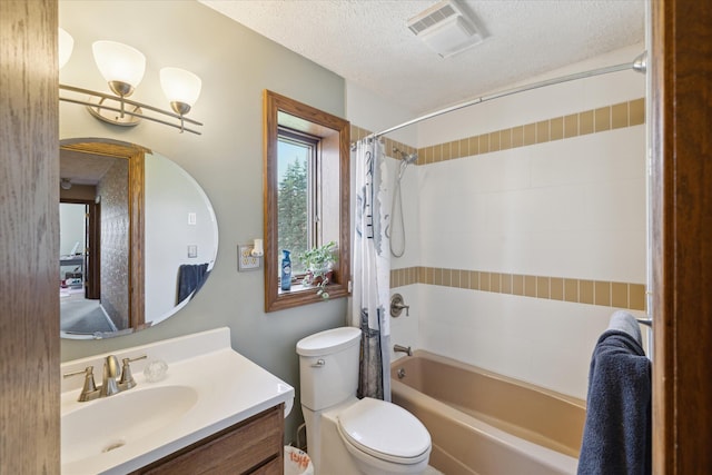 full bath with a textured ceiling, shower / bath combination with curtain, visible vents, vanity, and toilet