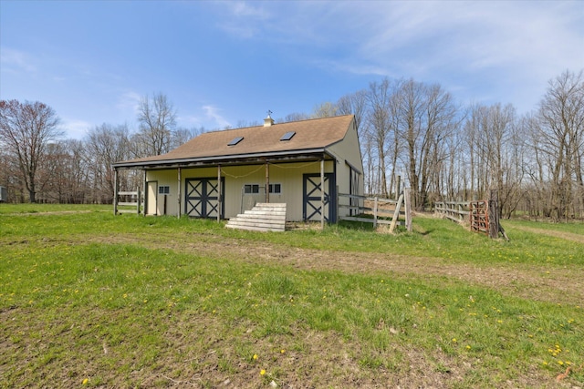 view of outbuilding with an exterior structure and an outbuilding