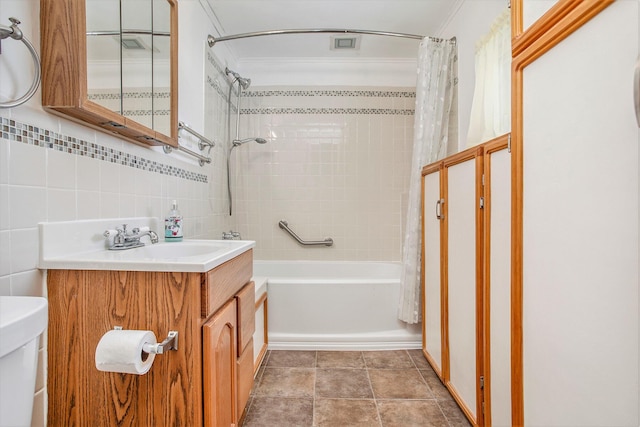 full bathroom with toilet, ornamental molding, shower / tub combo, and vanity