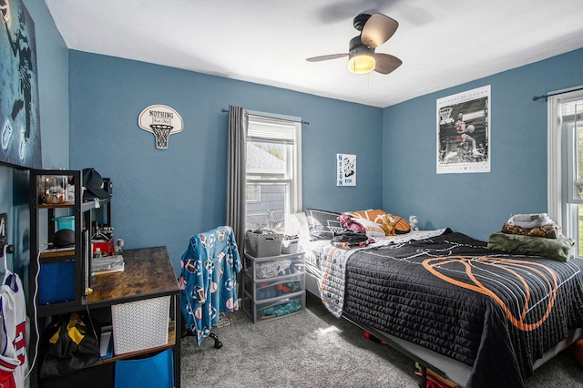 carpeted bedroom featuring ceiling fan