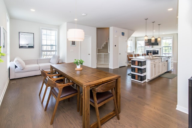 2841 Hardwick Rd, Ann Arbor, MI 48105 - dining area featuring stairway, baseboards, recessed lighting, and dark wood finished floors