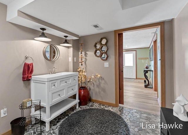 entrance foyer featuring visible vents and baseboards