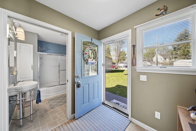 5576 Rays Dr, Onsted, MI 49265 - doorway featuring baseboards