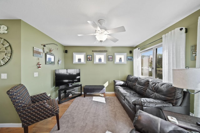 5576 Rays Dr, Onsted, MI 49265 - living room with baseboards, ceiling fan, and wood finished floors