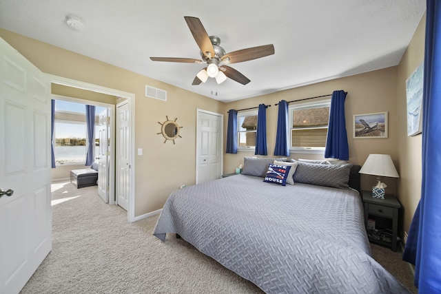 5576 Rays Dr, Onsted, MI 49265 - bedroom featuring visible vents, carpet flooring, baseboards, and multiple windows