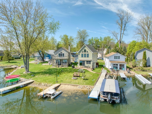 5576 Rays Dr, Onsted, MI 49265 - view of dock with a water view, boat lift, and a yard