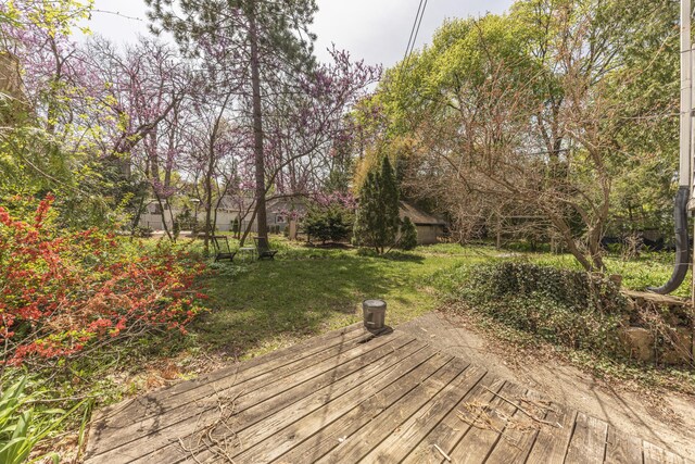1324 Wells St, Ann Arbor, MI 48104 - wooden deck with a yard