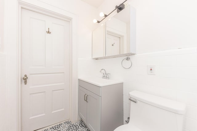 1324 Wells St, Ann Arbor, MI 48104 - half bath featuring vanity and toilet