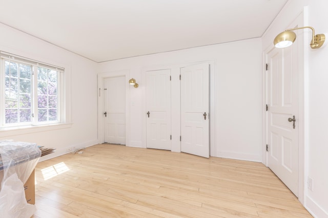 1324 Wells St, Ann Arbor, MI 48104 - entryway with baseboards and light wood-type flooring
