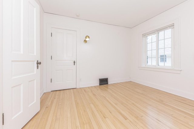 1324 Wells St, Ann Arbor, MI 48104 - spare room with visible vents and light wood-type flooring