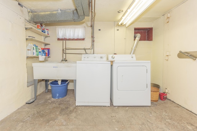 1324 Wells St, Ann Arbor, MI 48104 - laundry area featuring laundry area, a sink, and independent washer and dryer