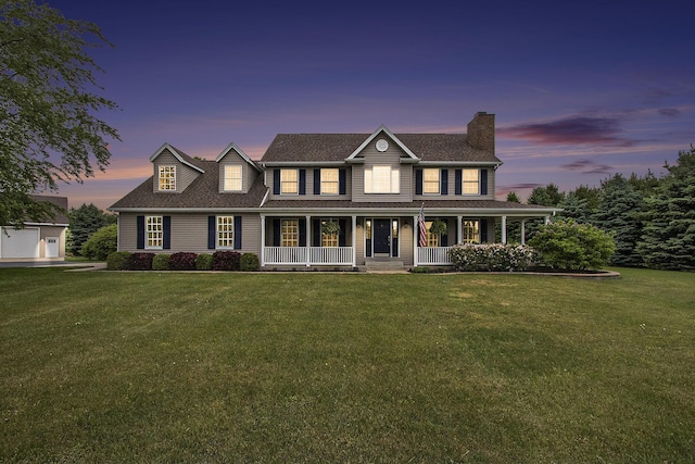 2191 W Linco Rd, Stevensville, MI 49127 - view of front facade with a chimney, covered porch, a lawn, and a shingled roof