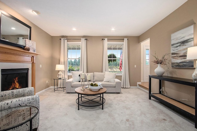 2191 W Linco Rd, Stevensville, MI 49127 - living area with carpet, baseboards, a lit fireplace, and recessed lighting