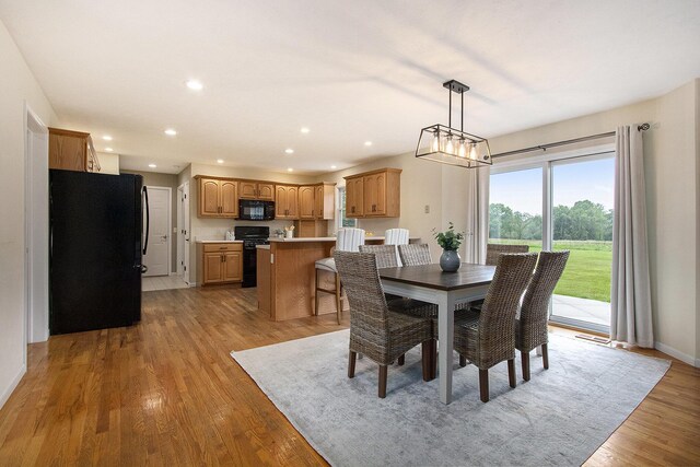 2191 W Linco Rd, Stevensville, MI 49127 - dining space with recessed lighting, light wood finished floors, and baseboards