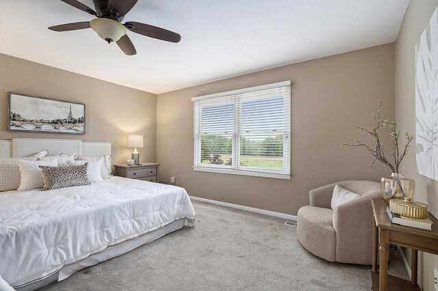 2191 W Linco Rd, Stevensville, MI 49127 - carpeted bedroom with baseboards and a ceiling fan