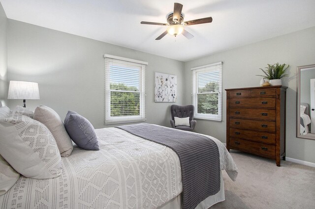 2191 W Linco Rd, Stevensville, MI 49127 - bedroom featuring light colored carpet, a ceiling fan, and baseboards