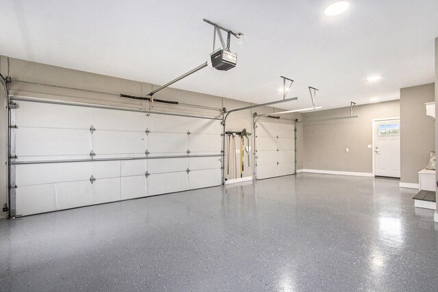 2191 W Linco Rd, Stevensville, MI 49127 - garage with a garage door opener and baseboards
