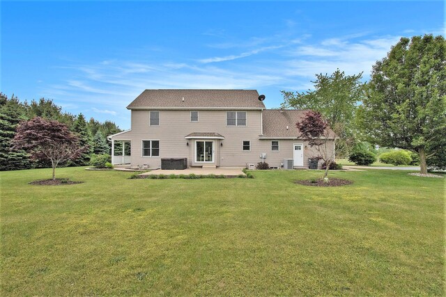 2191 W Linco Rd, Stevensville, MI 49127 - back of property featuring a patio and a lawn
