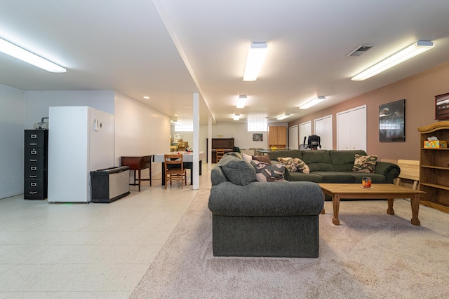 living area featuring visible vents