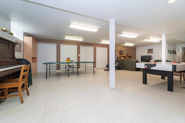 playroom featuring light floors