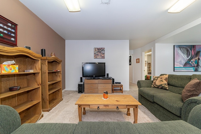living area with light colored carpet