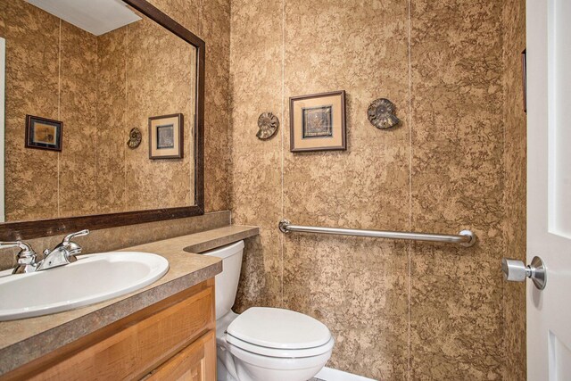 2347 W W Dowling Rd, Delton, MI 49046 - bathroom featuring toilet and vanity