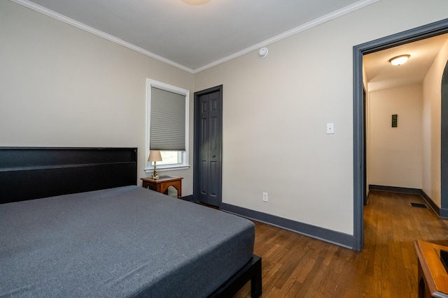 10401 Jericho Rd, Bridgman, MI 49106 - bedroom with crown molding, baseboards, and wood finished floors