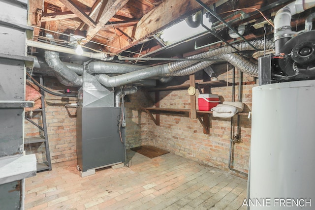 69 W 13th St, Holland, MI 49423 - utility room with gas water heater and heating unit