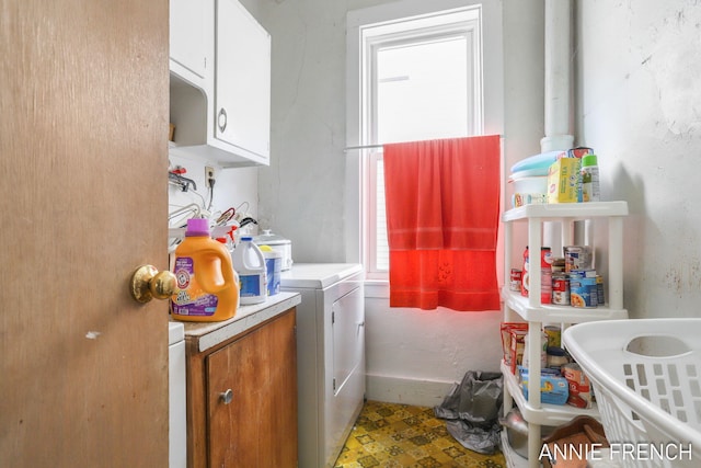 69 W 13th St, Holland, MI 49423 - laundry room featuring cabinet space and separate washer and dryer