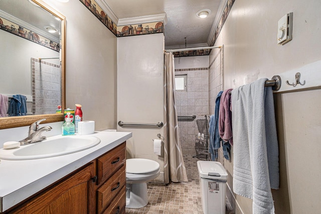 14770 Panu Ave, Kaleva, MI 49645 - bathroom featuring vanity, tiled shower, toilet, and crown molding