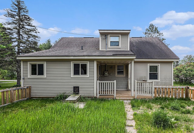 14770 Panu Ave, Kaleva, MI 49645 - rear view of property with roof with shingles and a porch