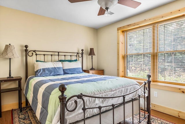 80220 Linden Hills St, Covert, MI 49043 - bedroom with wood finished floors, baseboards, and ceiling fan