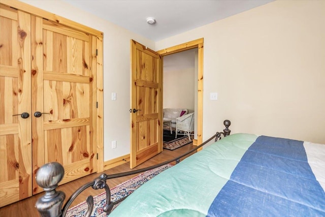 80220 Linden Hills St, Covert, MI 49043 - bedroom with wood finished floors and baseboards
