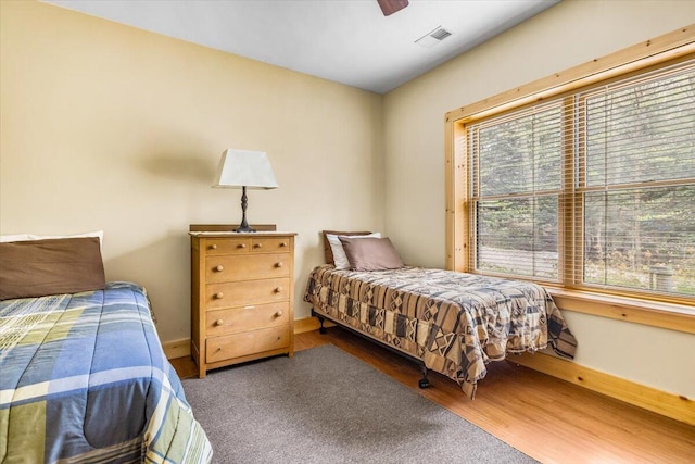 80220 Linden Hills St, Covert, MI 49043 - bedroom featuring wood finished floors, baseboards, and a ceiling fan